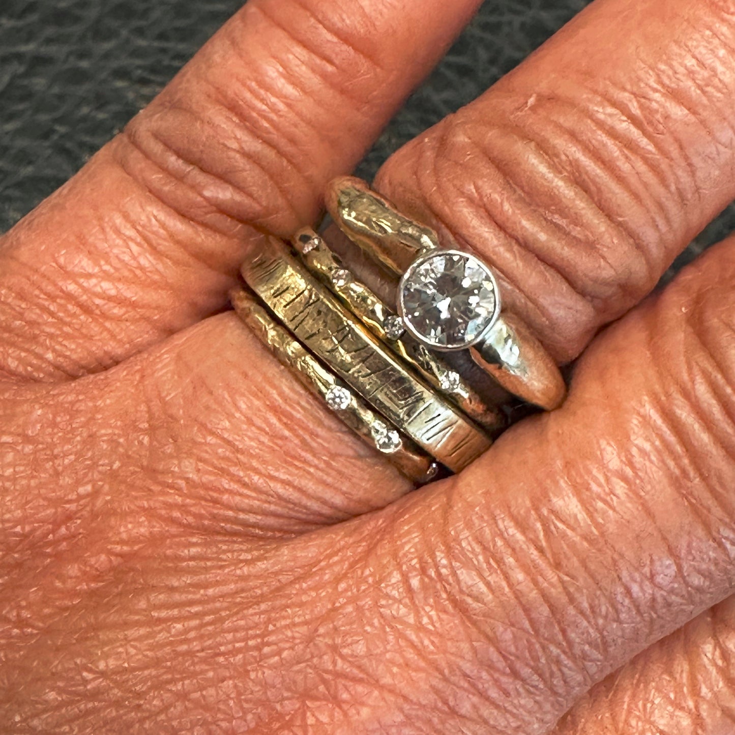 18kt Gold Rings in Luxe Collection on person