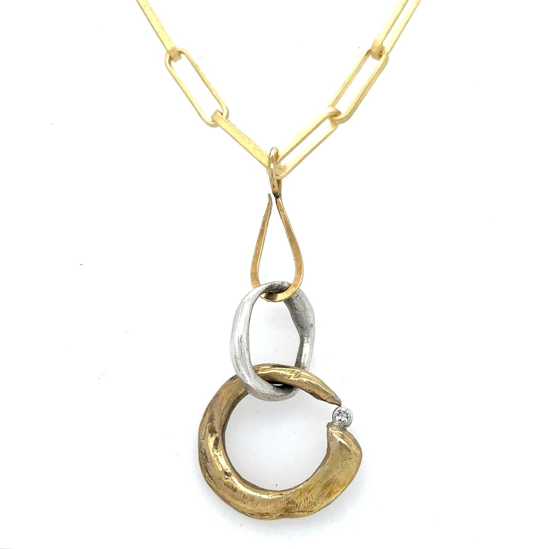 Ascendant Talisman Pendant featured on the Brass Tear Drop Connector and Gold Link Chain