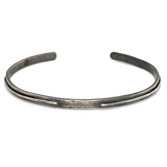 Embrace Oneness and foster a sense of undivided connection with the Unity Cuff. It's a symbol of peace, harmony, and the unifying force that binds us all together. Each is handcrafted in sterling silver and designed for the men in your life!