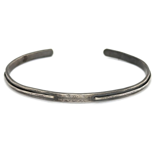Embrace Oneness and foster a sense of undivided connection with the Unity Cuff. It's a symbol of peace, harmony, and the unifying force that binds us all together. Each is handcrafted in sterling silver and designed for the men in your life!