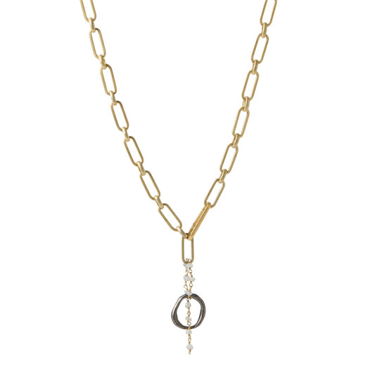The Celestial Orbit Necklace with 14k gold plate chain links represent the structured path of the sun and captures the moon's intuitive rhythm. While the moonstones in this piece do more than catch the light – they actively work to balance your emotional body.