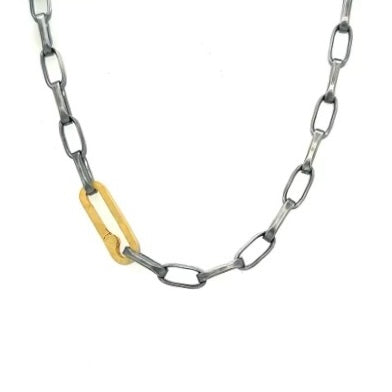 This sophisticated chain is made of solid sterling silver and the weight of it is luxurious. It has a brushed oxidized silver finish. Links are 3/8" in size. The closure is our Gold Paper Clip Connector which is designed to easily attach your Talisman collection.