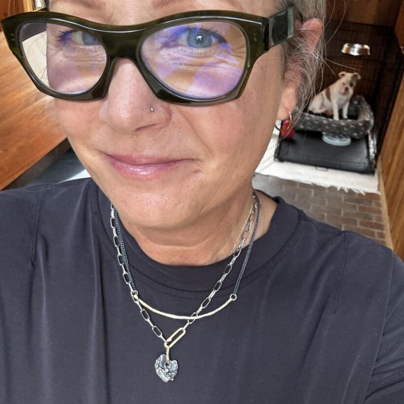 Customer wearing the Love Talisman Pendant on Silver Oxidized Chain with Gold Paper Clip