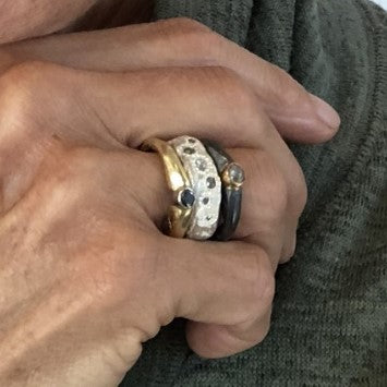 Customers stack of Devotion Rings and Thrive Ring