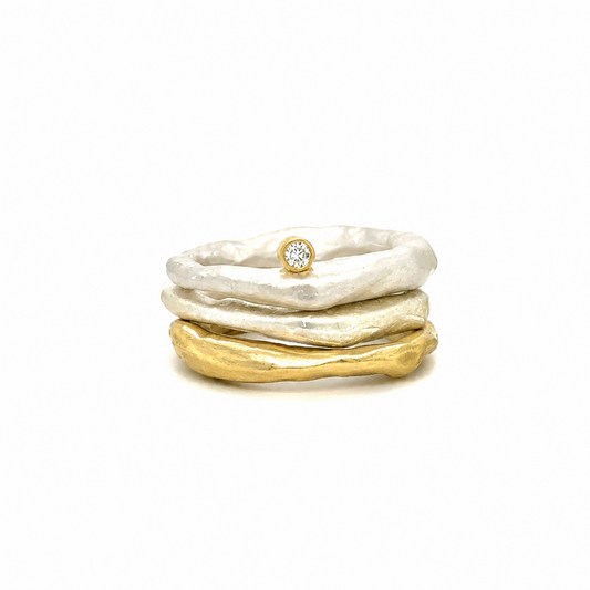 Unlock your inner dreamer with the Dreamer Stack. Combining the Alchemist and Odyssey rings, this stack will take you on an adventure you'll never forget. Dare to explore and reach new heights with the Dreamer Stack! This lovely stack was featured in Sports Illustrated Swim.