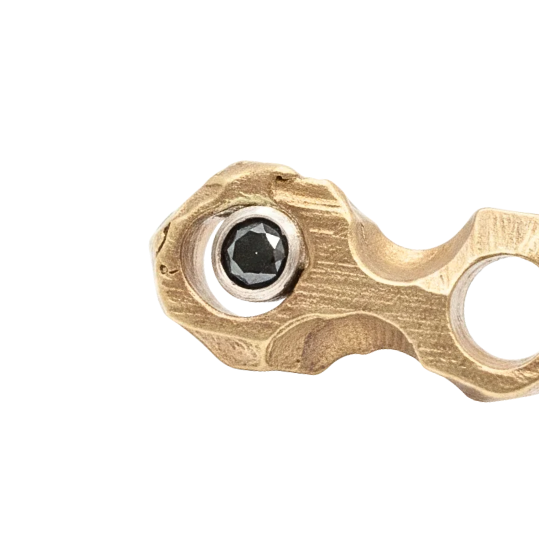 Close up of the Black Diamond set in sterling silver bezel on the Cell Stud Earrings from the Hive Collection