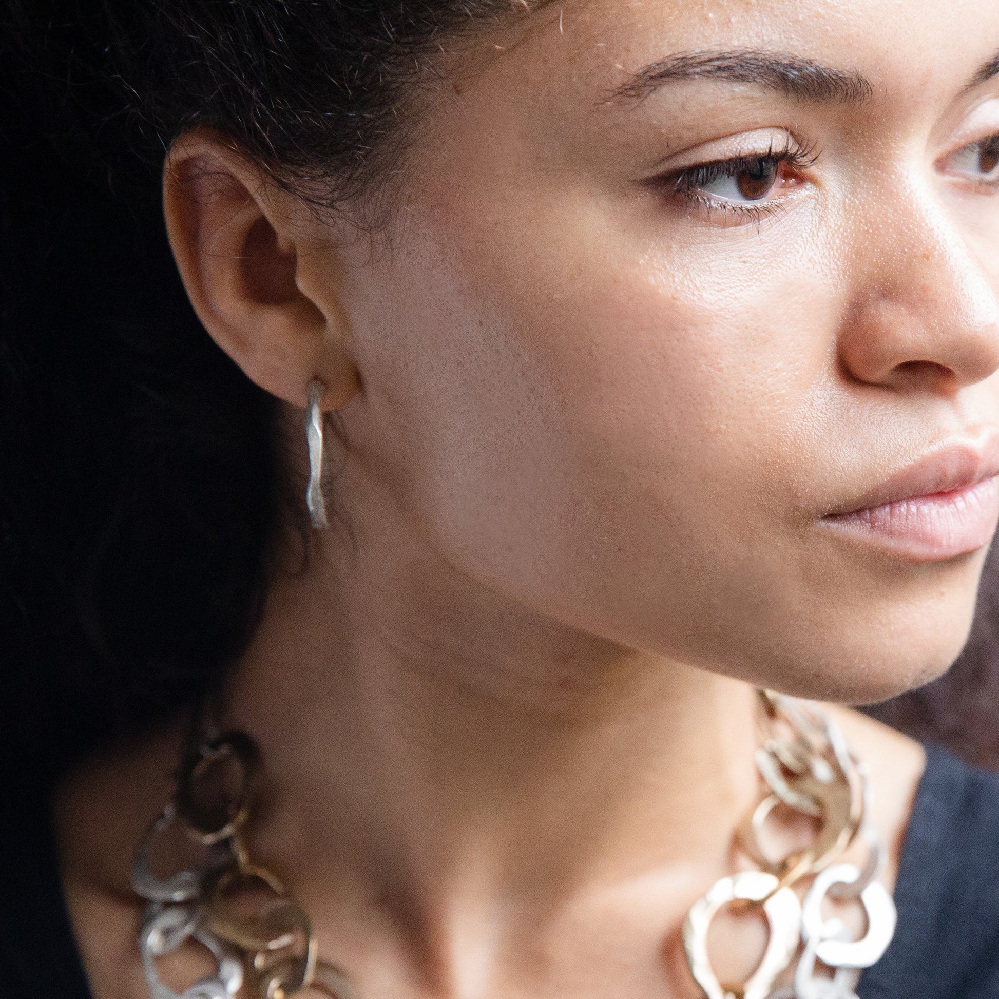 The Stonehenge Hoop Earrings in Silver on Model