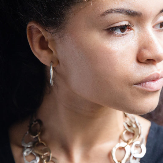 The Stonehenge Hoop Earrings in Silver on Model