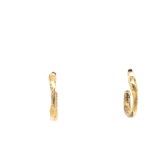 The Satori Hoop Earrings follow no template but their own. Each curve is deliberate yet organic, carrying the subtle marks of their creation - a celebration of wabi-sabi, the beauty found in imperfection. The solid 18kt gold catches the light in ways that change as you move, sometimes bold, sometimes whispering.