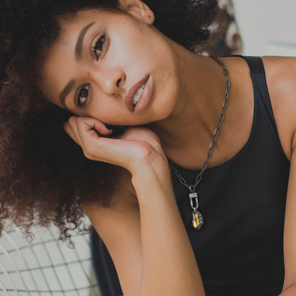 Model wearing Gratitude Talisman Pendant in Silver with Keum Boo on the Lock Connector and Oxidized Silver Chain