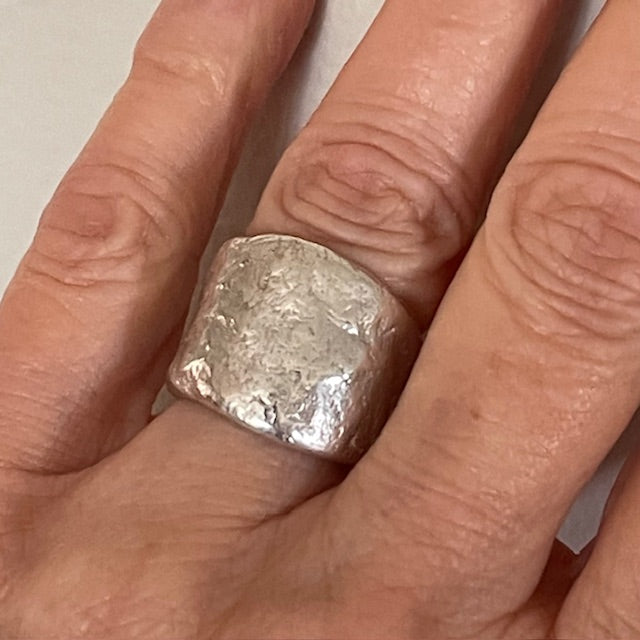 Close up of Origin Ring in Silver on hand