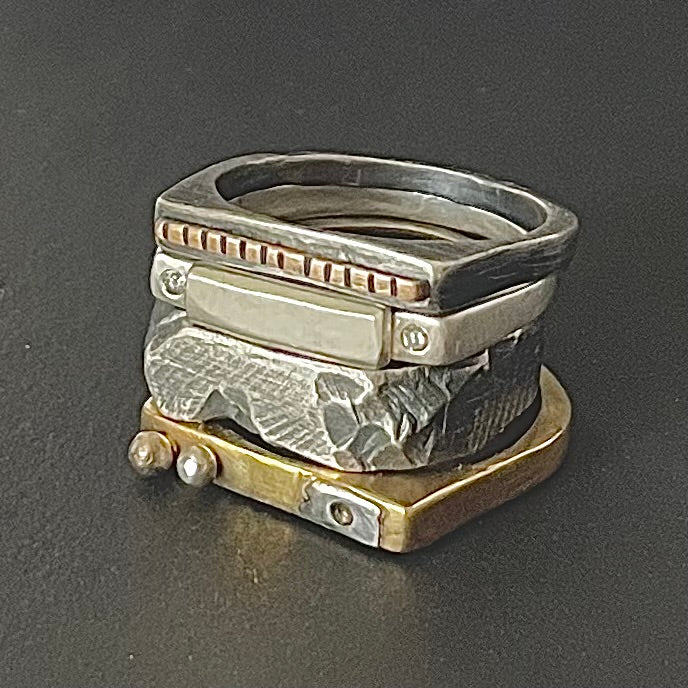 Stack of Solar Terrain Ring in Silver and Trinity Ring Stack