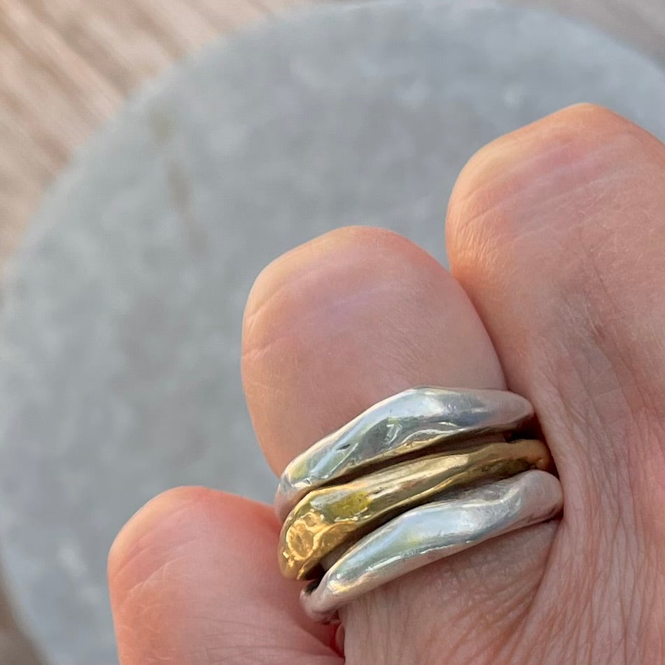 Close up of Alchemist Stacking Rings Combination 2 shown on hand