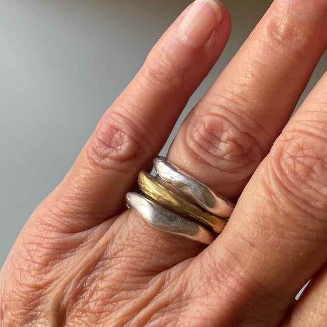 Alchemist Stacking Rings Combination 2 shown on customers hand