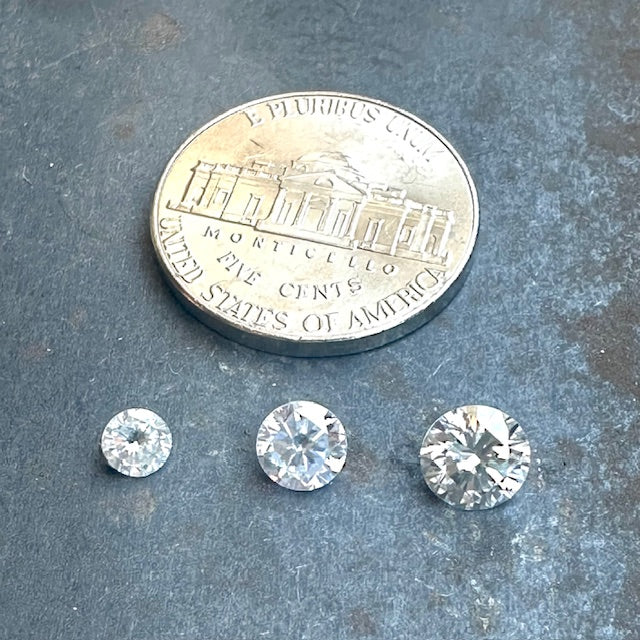 Scale of 4/5/6mm diamonds shown next to a nickel