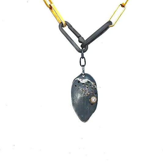 Crafted with precision and care, the gold link chain features double paper clip clasps, adding a subtle yet distinctive edge. But what truly sets this piece apart is the enchanting Desire Talisman it carries. Unveil the magic of keeping your most intimate wishes close to your heart—a hidden compartment within the talisman lets you carry your secret desires discreetly and stylishly.