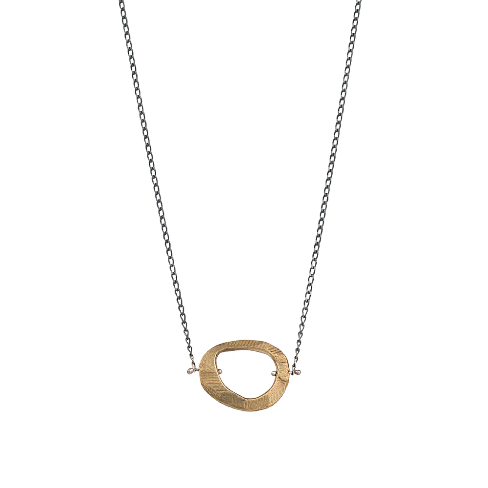The Skipping Stones Simple Necklace in Bronze is the essential necklace to layer or wear solo for an effortless style.