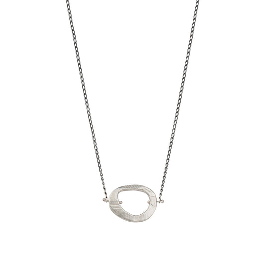 The Silver Skipping Stones Simple Necklace is the essential necklace perfect for layering or wearing on its own.
