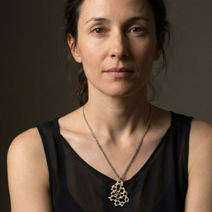 The Colony Pendant Necklace from the Hive Collection on a model