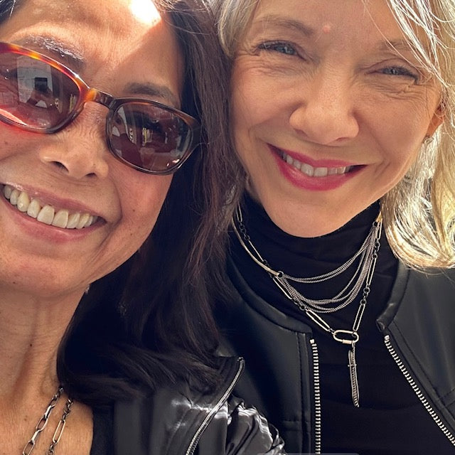 Cascade Layers Necklace Layered with other Chain and Talisman on a person