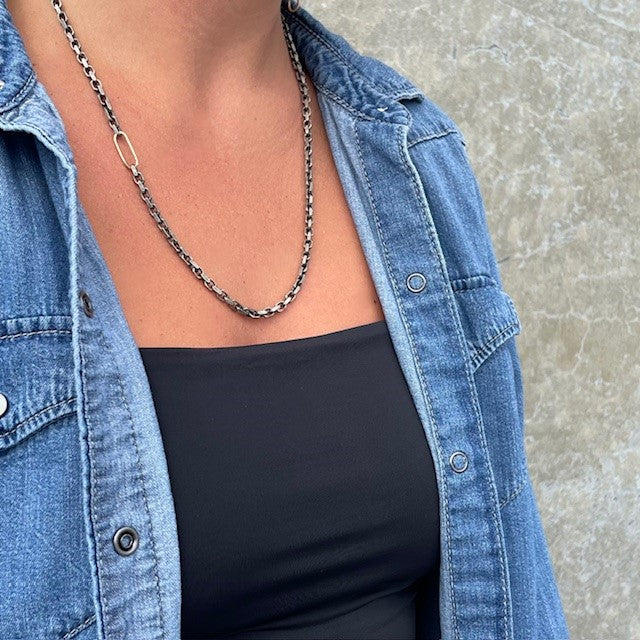 Spark Chain Necklace on a person