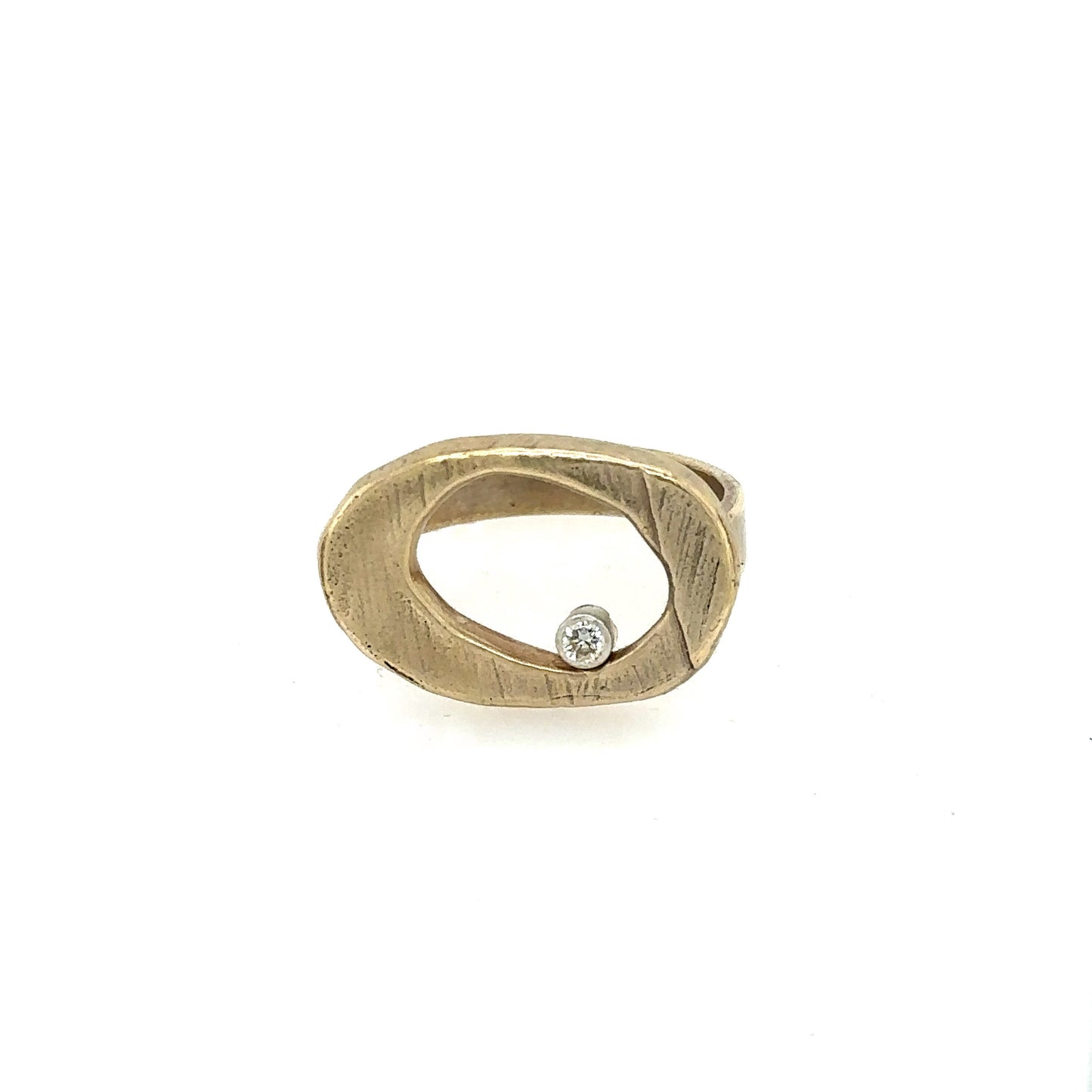 The Ovum Ring is a timeless and symbolic piece perfect for anyone looking to manifest a new chapter in their life. Ovals have been used to represent rebirth since ancient times, and this ring is no exception. Its sleek design features a perfectly shaped oval with a bezel set white diamond. It's a powerful symbol and a reminder that no matter what happens in life, there is always a chance for renewal and growth.