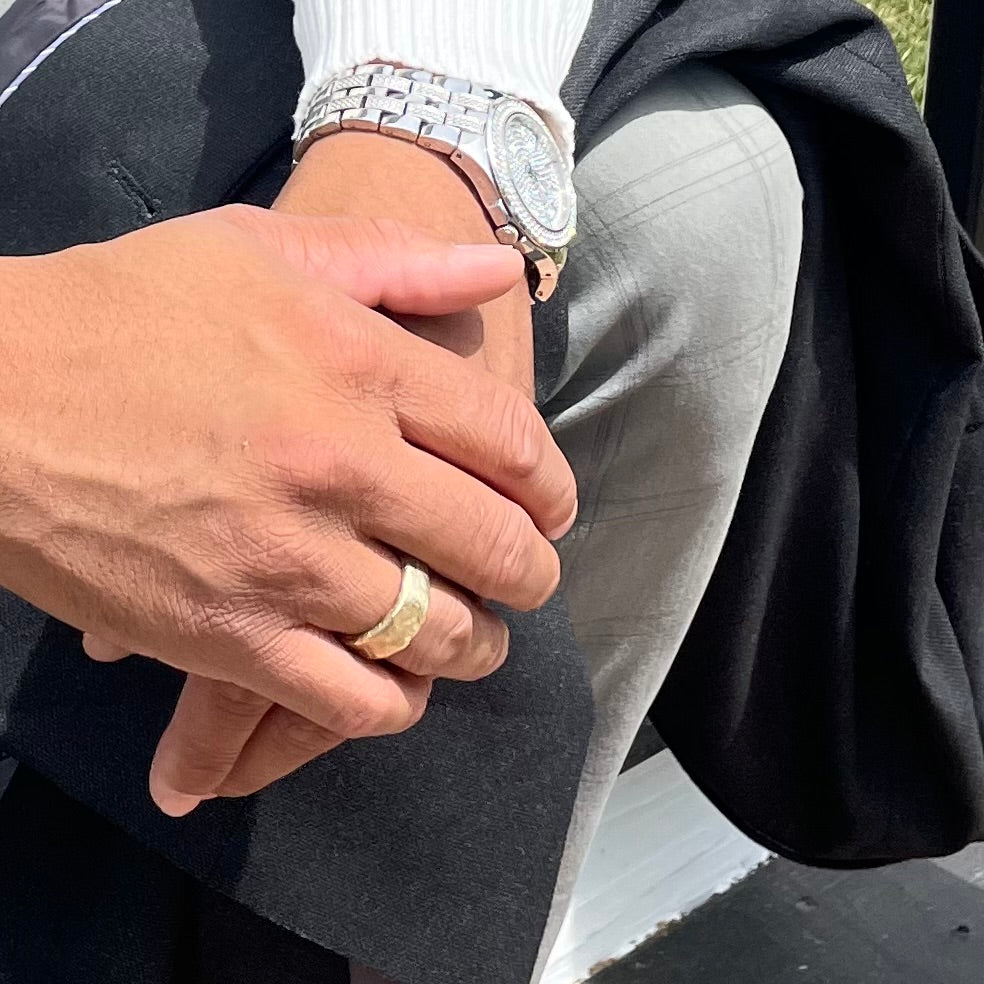 The Rebel Ring in Bronze on persons hand