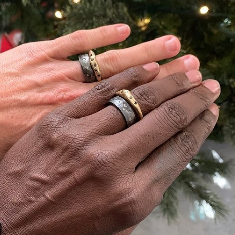 Couple wearing the Constellation Ring in Bronze and Venus Ring with Diamonds