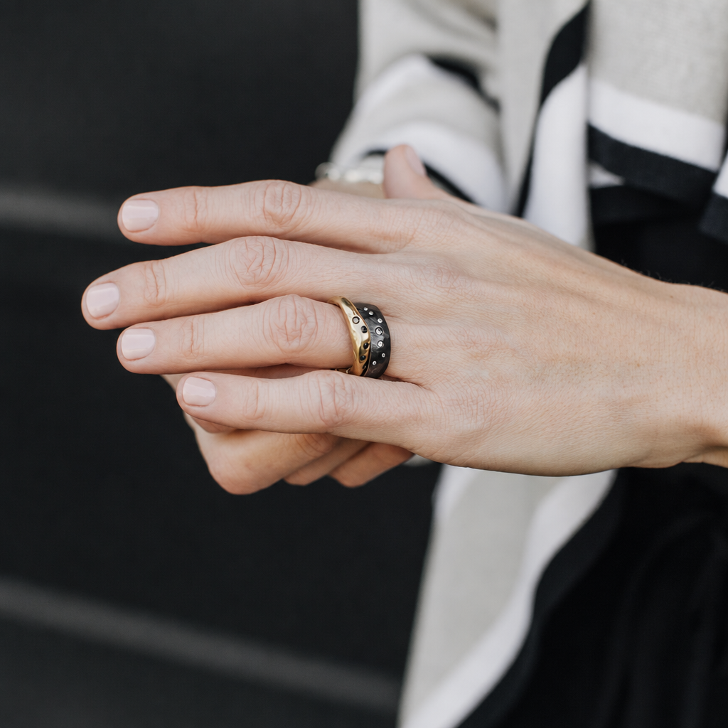 The Constellation Ring in Bronze and Venus Ring with Diamonds on Model