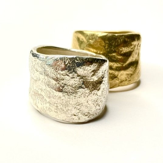 Close up of Origin Rings in Silver and Bronze