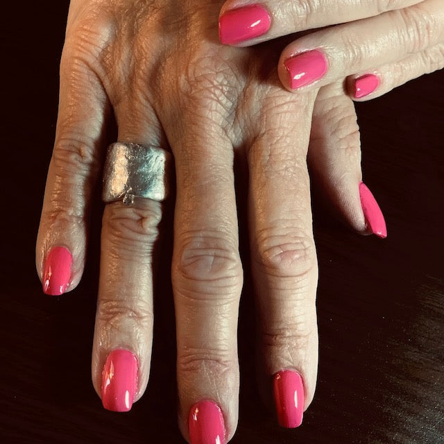 Close-up of hand with Relic Ring in Silver