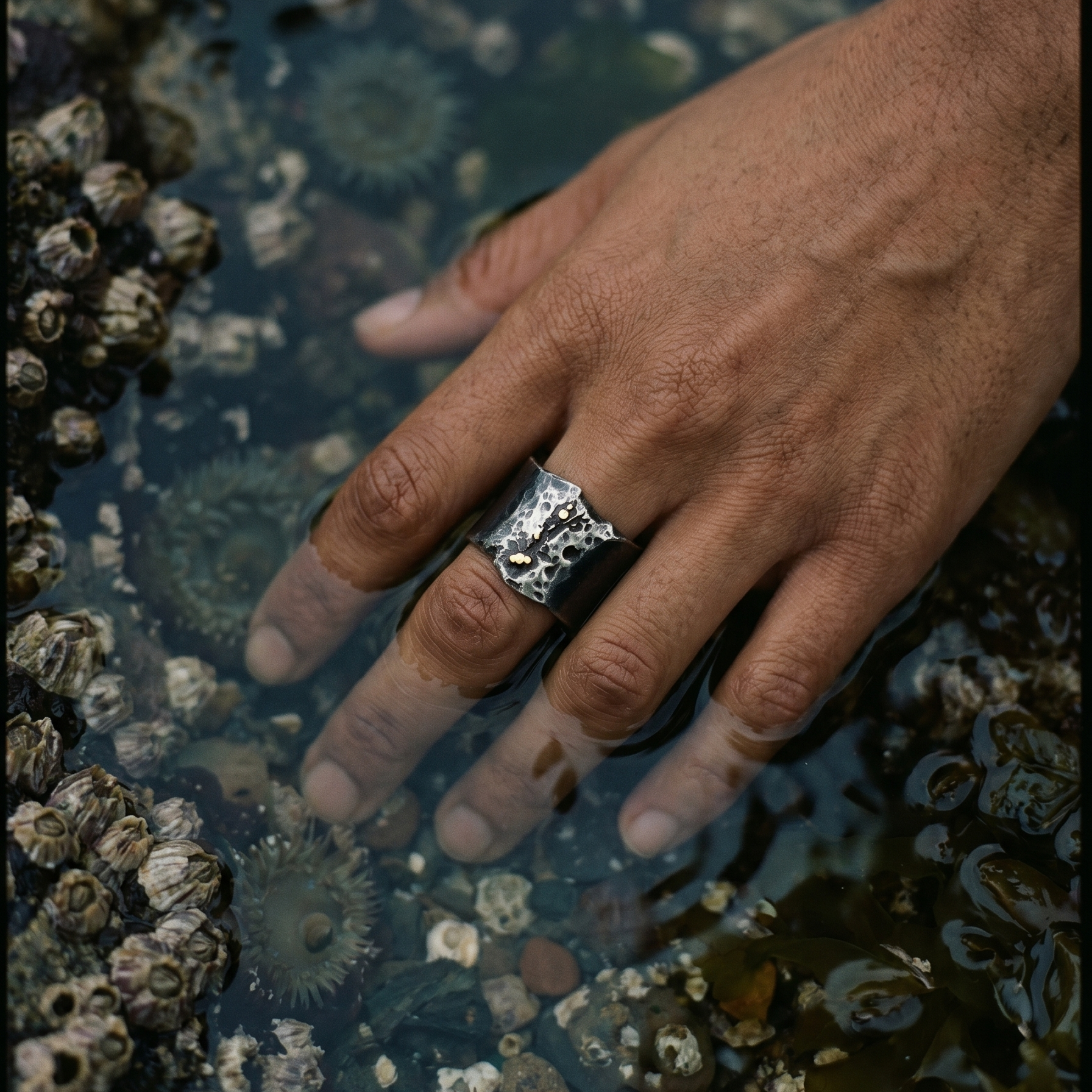 Tidal Pool Ring on Model's hand in water