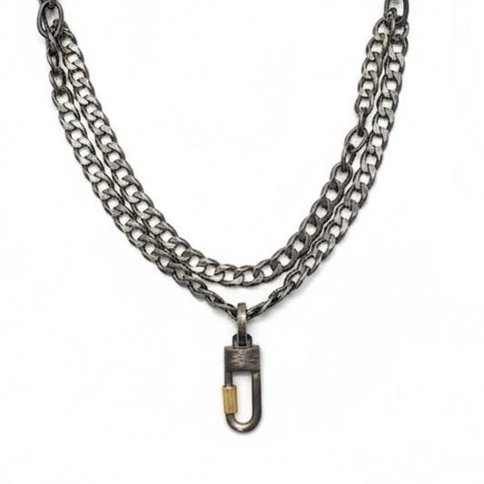 We've combined two cool oxidized sterling chains - one is a chunky flat curb & the other a large link oval on this layered necklace. You can add a few Talisman to the Sterling Lock Connector and turn up the volume!