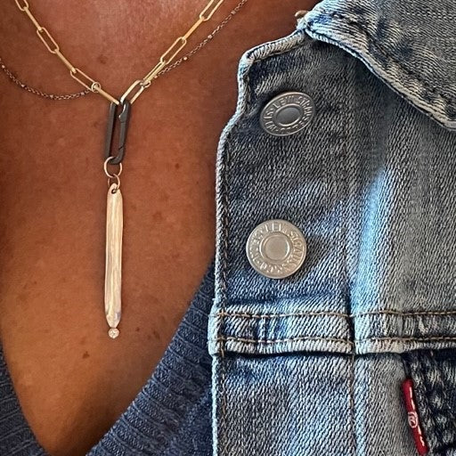 Strength Talisman Pendant shown on the Fine Layered Chain