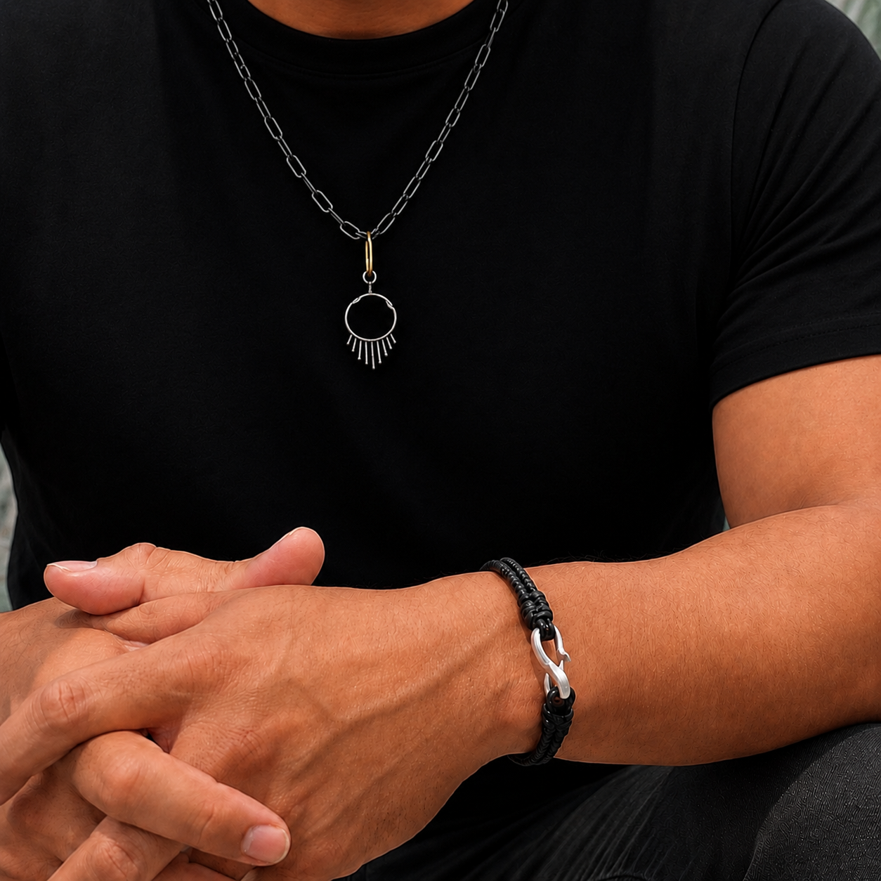 Male Model wearing Healing Talisman on Oxidized Silver Chain with Gold Paperclip Connector & Interwoven Bracelet with Silver Clasp