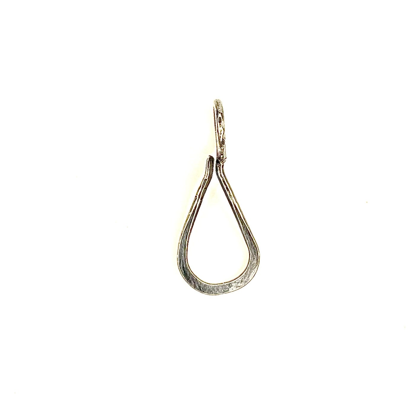 The Silver Tear Drop Connector measures approx 1" long and 3/8" wide. It's designed to easily attach your Talisman Pendants. Will slide over most chains.