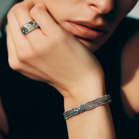 Tidal Force Cuff and Solar Terrain Ring in Silver on Model