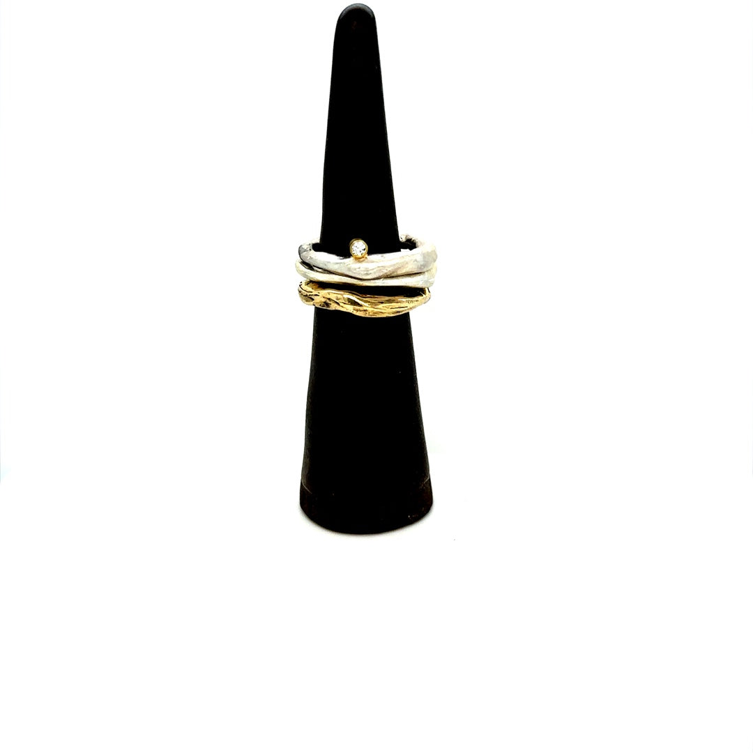 Unlock your inner dreamer with the Dreamer Stack. Combining the Alchemist and Odyssey rings, this stack will take you on an adventure you'll never forget. Dare to explore and reach new heights with the Dreamer Stack! This lovely stack was featured in Sports Illustrated Swim.
