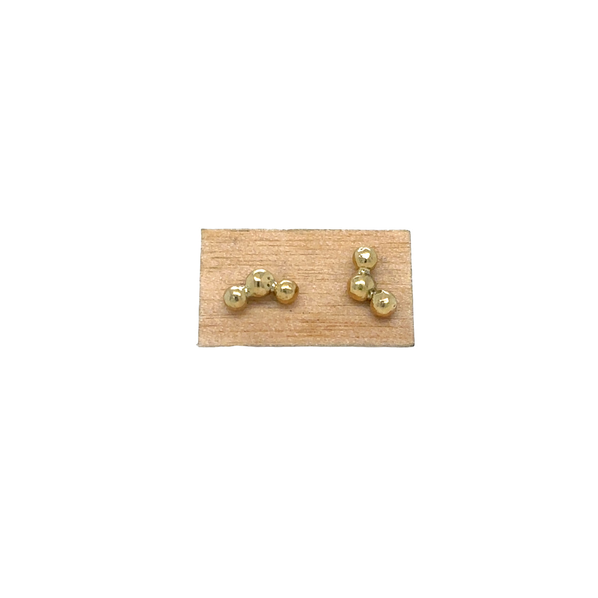 Hoshi Stud Earrings shown on Wood Fiber Paper
