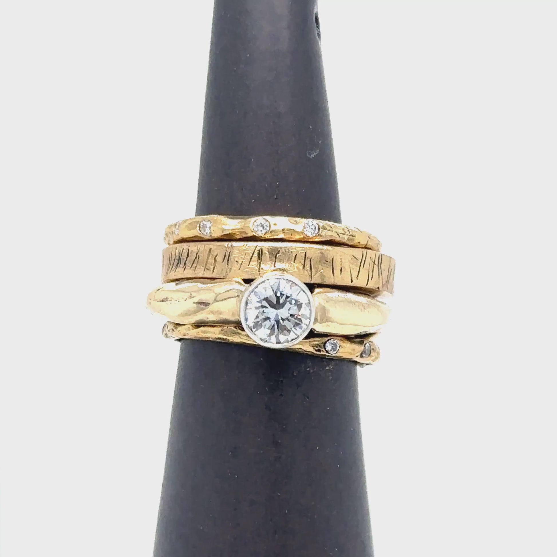 Video of 18kt Gold Rings in Luxe Collection on Ring stand