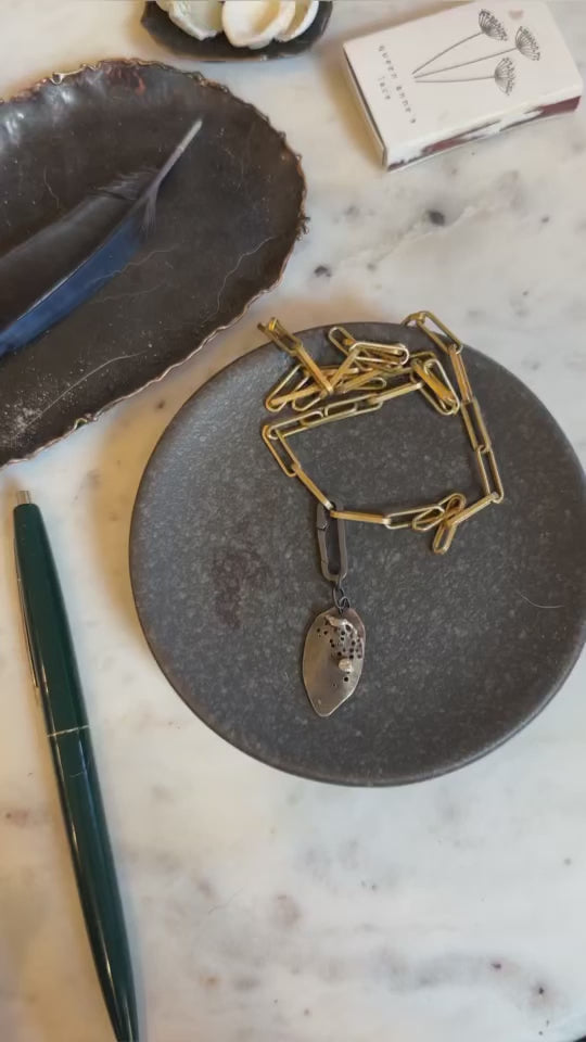 Video of writing and placing a personal message into the Desire Talisman Pendant
