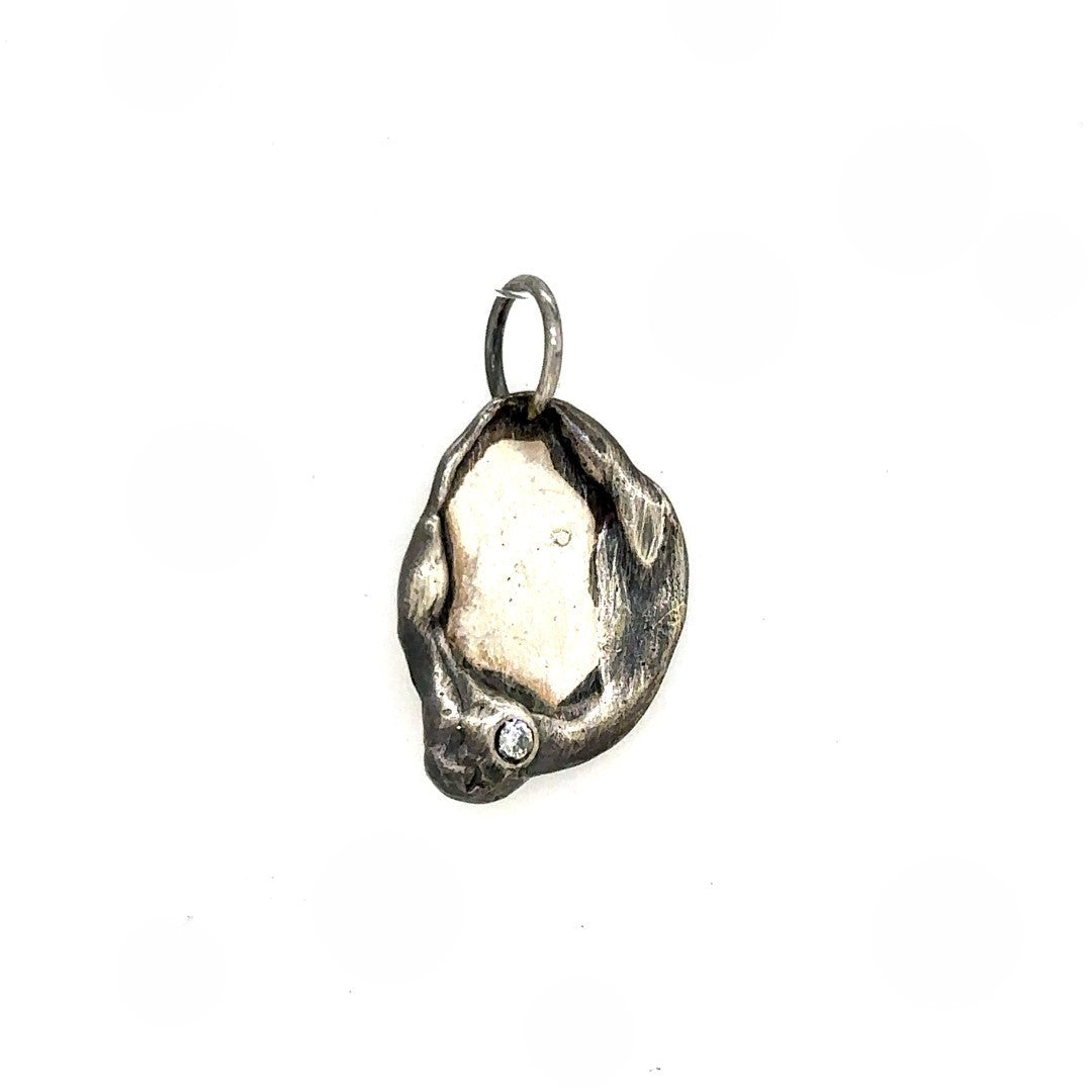 The Reflection Talisman was created to encourage us to take moments of reflection, to think about what we have done well, and to pay attention to areas where we need to redirect. Without reflection, we can get caught in a loop. With reflection, we gain perspective and are better prepared to take on life's challenges.