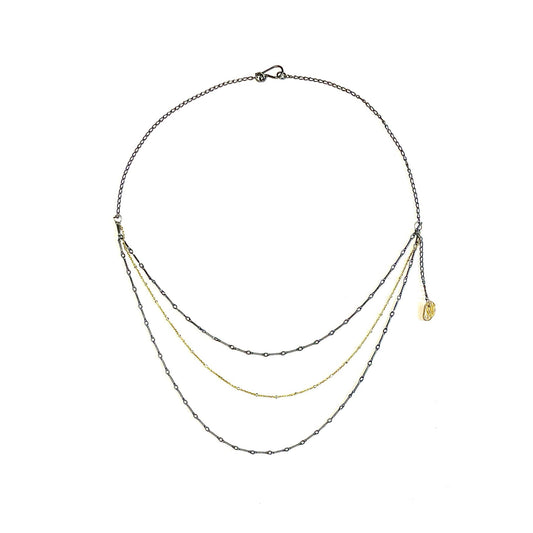 A delicate and stunning necklace! Get the look of layers in one simple beauty.