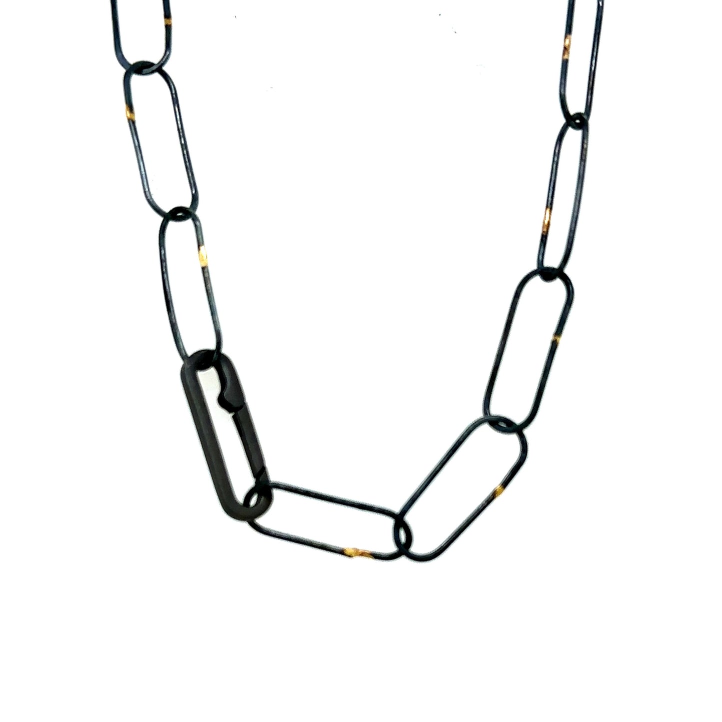 Made in our Seattle Studio, this chain is so refined. Silver links are formed, soldered, oxidized and then accented with 14kt gold. It's uncomplicated and perfect for a few Talisman.