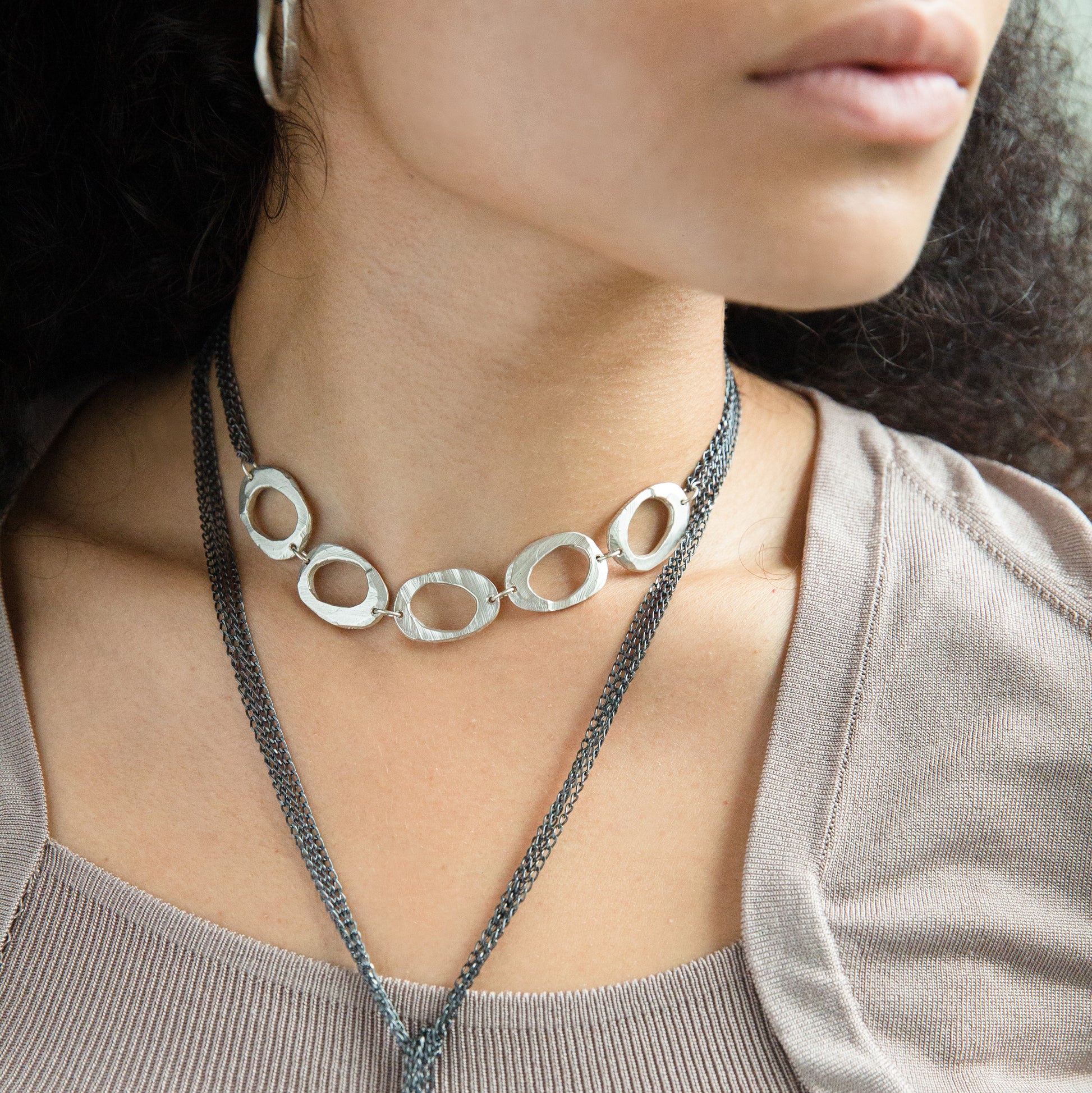 Close up of Five Oval Wrap with Diamond Necklace on Model