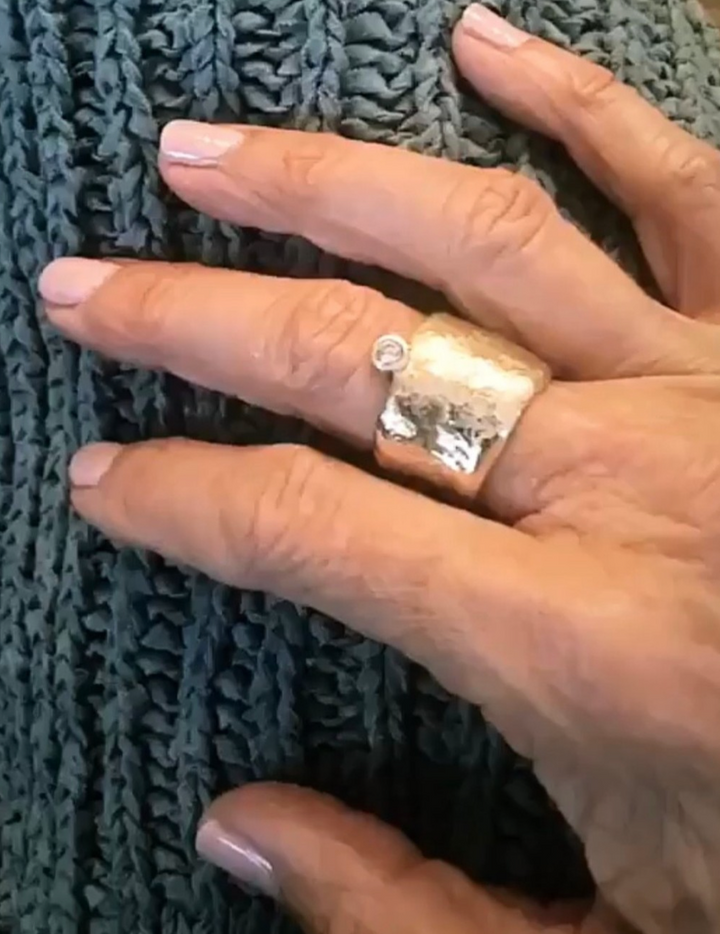 customer wearing relic ring