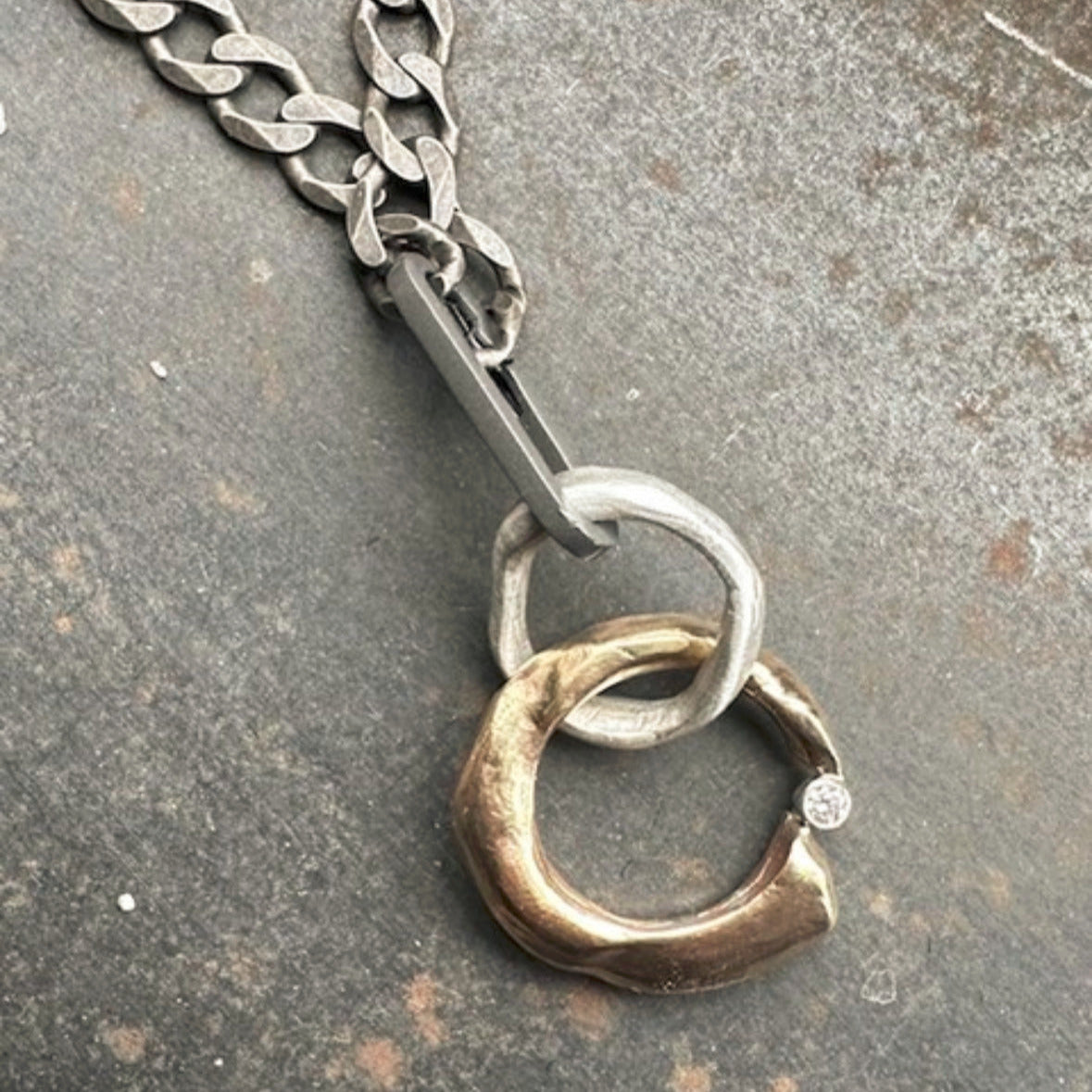 Ascendant Talisman Pendant featured on the Flat Curb Chain 