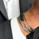 Unity Cuff, Interwoven Bracelet with Bronze Clasp, and customers personal cuff worn as a stack