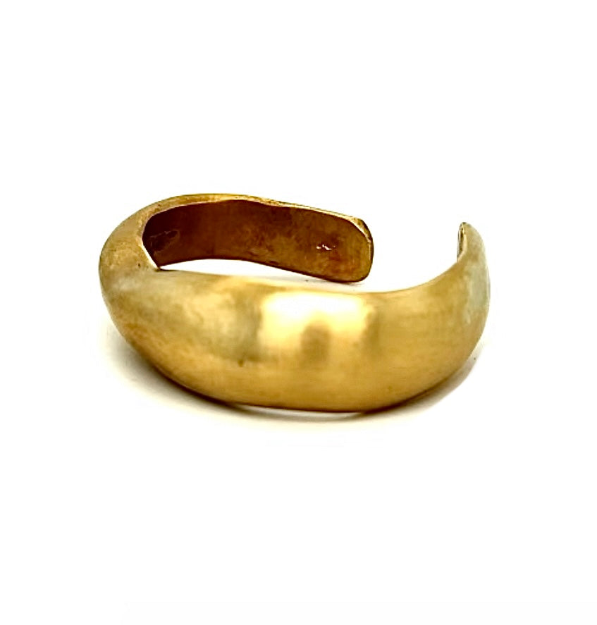 The Divine Cuff effortlessly combines boldness and grace, with its sculptural design and flowing lines. The unparalleled beauty of hand cast bronze embodies quality, artistry and the essence of wabi-sabi design.