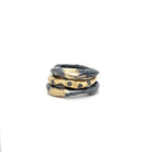The Celestial Ring Stack: a captivating ensemble that embodies the mystery and elegance of the cosmos. This exquisite stack is a symphony of two element rings, united with the astral beauty of the constellation ring, making it a true masterpiece for those who appreciate the finer details in life.